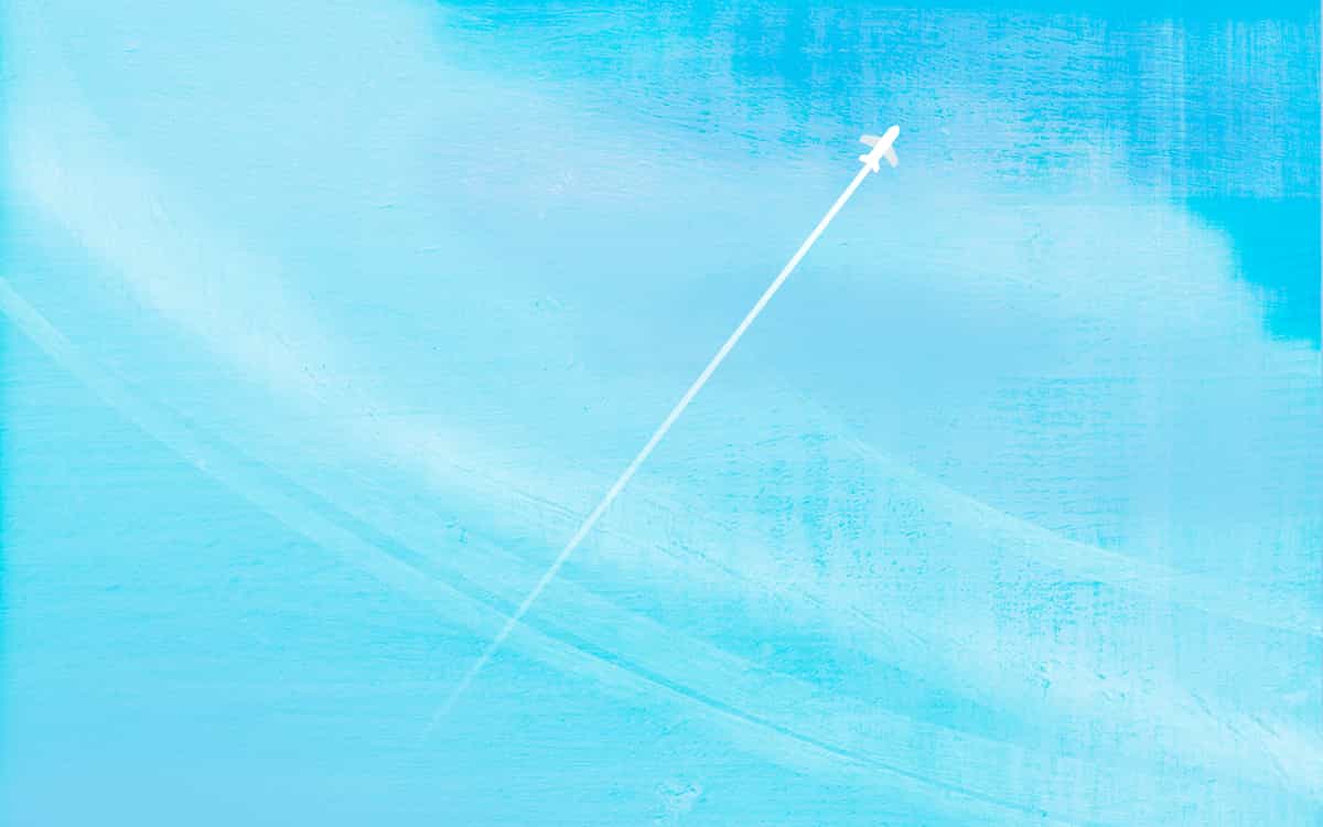 Illustration of a plane flying in the sky above, leaving a contrail.